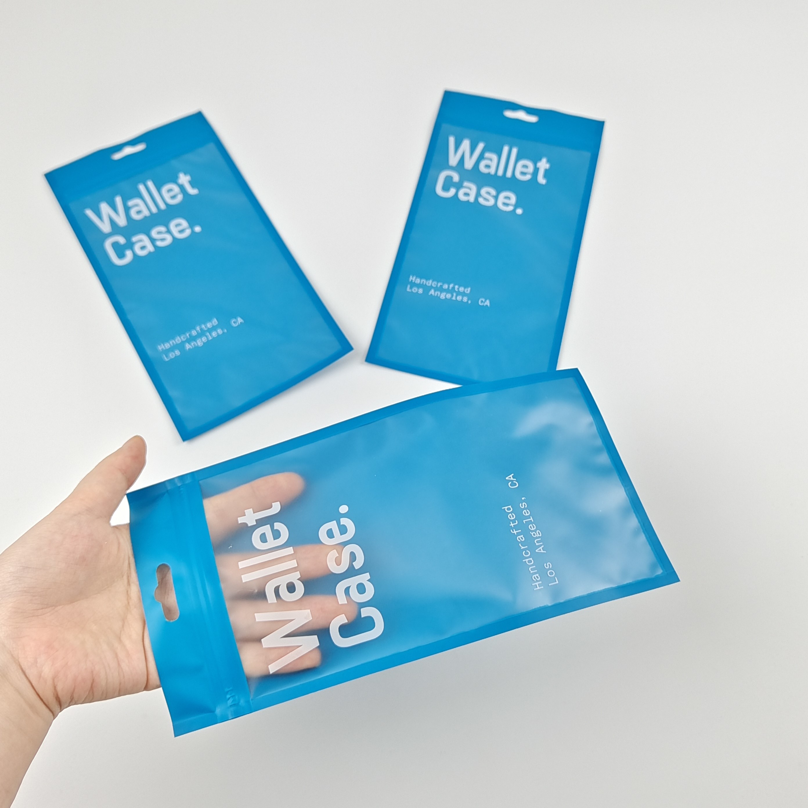 থ্রি সাইড সিলিং জিপার ফ্ল্যাট ওয়ালেট কেস ফোন কেস প্লাস্টিকের প্যাকেজিং ব্যাগ