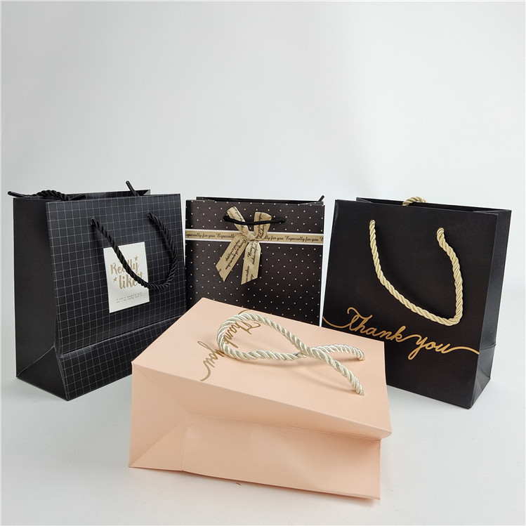 উচ্চ মানের কাস্টম ডিজিটাল প্রিন্টিং লোগো মুদ্রিত শপিং কাগজ ব্যাগ প্যাকেজিং সাদা 110 গ্রাম পুনরায় ব্যবহারযোগ্য