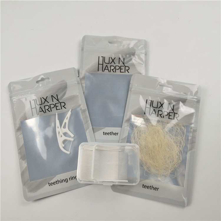 চকচকে পরিষ্কার ফ্রন্ট ডেন্টাল ফ্লস হ্যাং হোল প্লাস্টিকের ব্যাগ অ্যালুমিনিয়াম ফয়েল কাস্টমাইজড জিপ লক ব্যাগ প্যাকেজিং