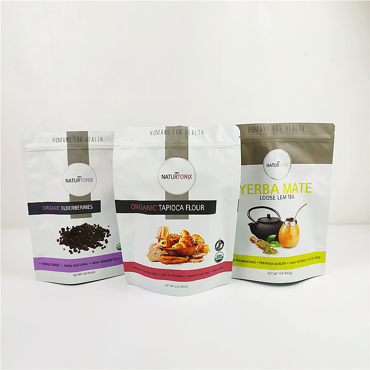 Gravure 120mic স্তরিত স্ট্যান্ড আপ হলোগ্রাম ব্যাগ VMPET MOPP প্লাস্টিক প্যাকেজিং ব্যাগ