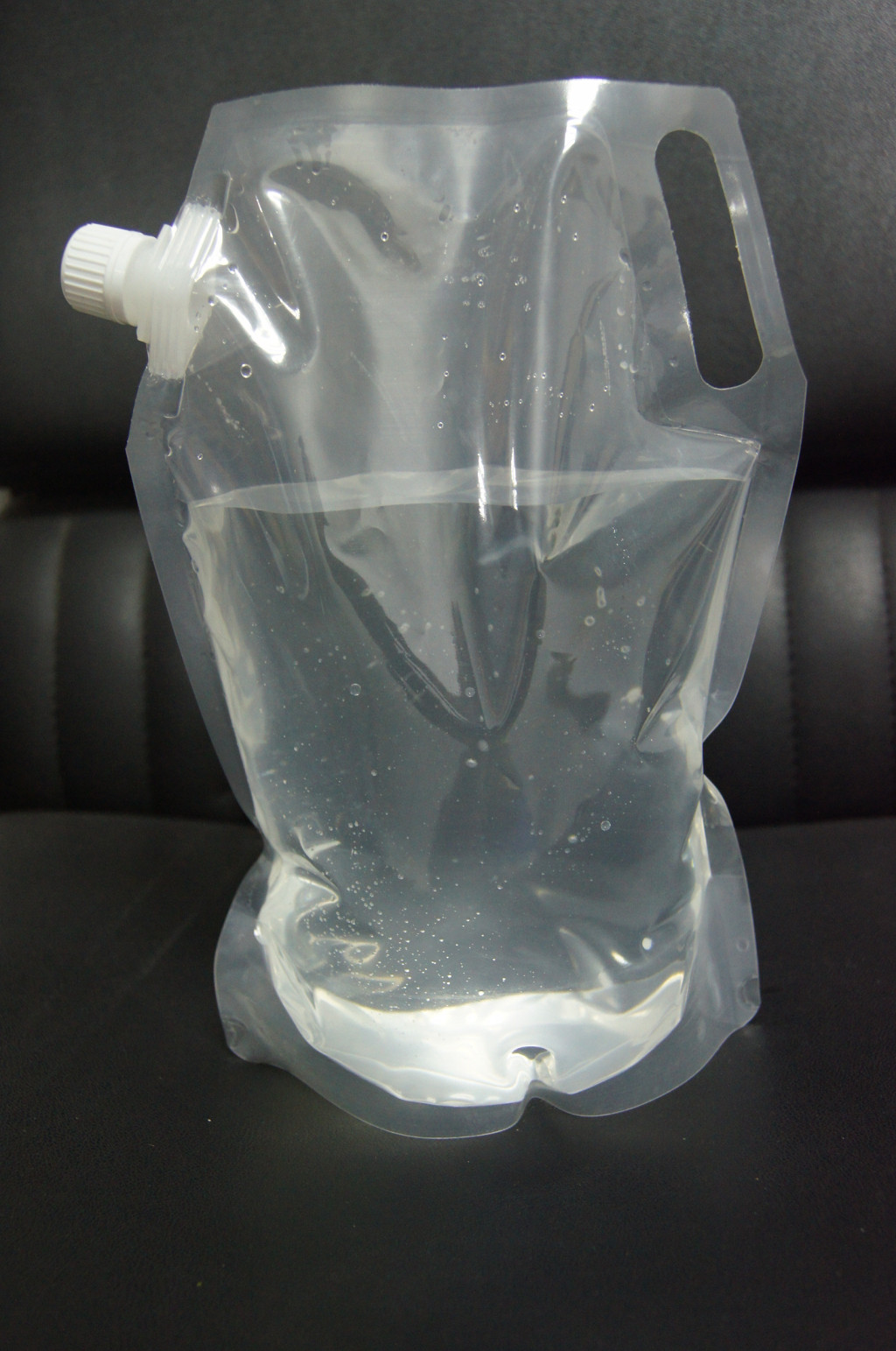 রঙিন মুদ্রণ জল প্রুফ স্ট্যান্ড আপ Liguid জন্য কোণার স্পাউট সঙ্গে প্যাকেজিং ব্যাগ